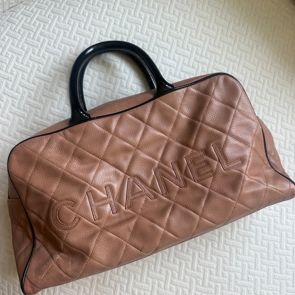 CHANEL Quilted Tan Leather Bag with Black Handles